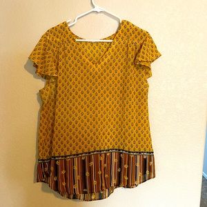 Yellow blouse with flowers